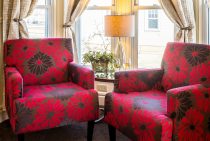 Two comfy red chairs in Sitting Area